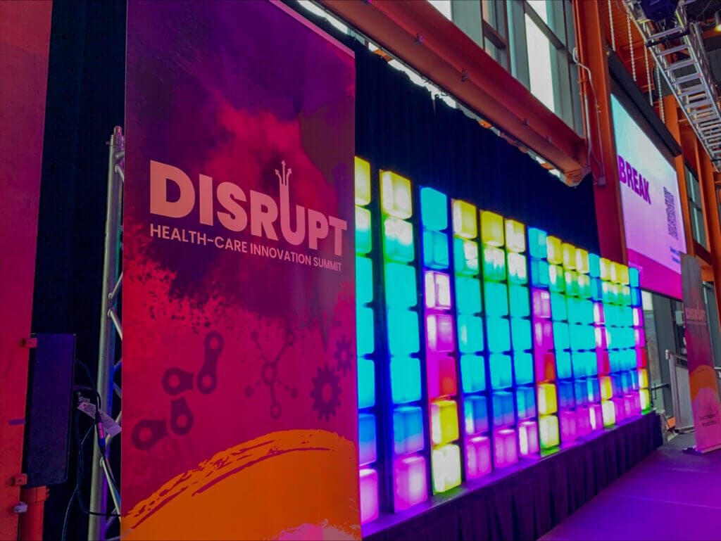 DISRUPT pull-up banner and wall of lights