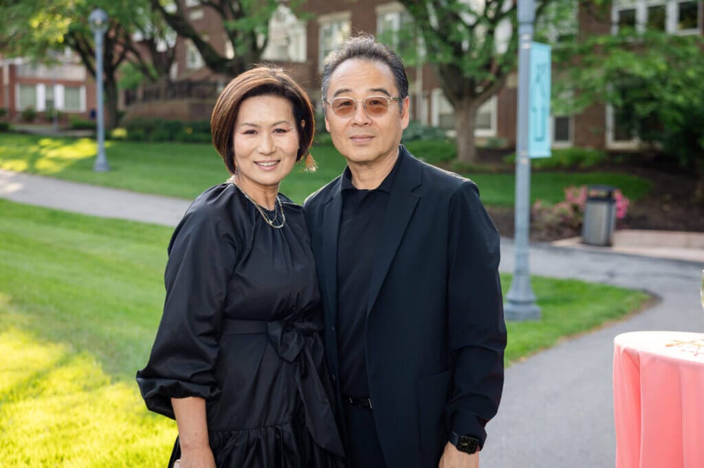Two people attending the Gala, looking at the camera
