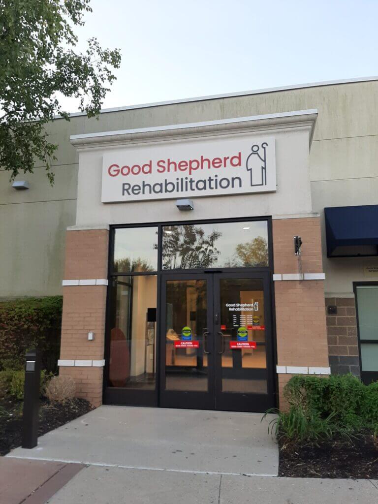 Exterior photo of the front entrance of Good Shepherd Rehabilitation's Physician Group medical practice at Promenade Saucon Valley in Center Valley, Pa.