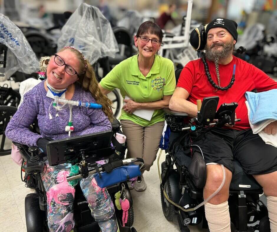 Tammy Kissel with two residents of Raker Center